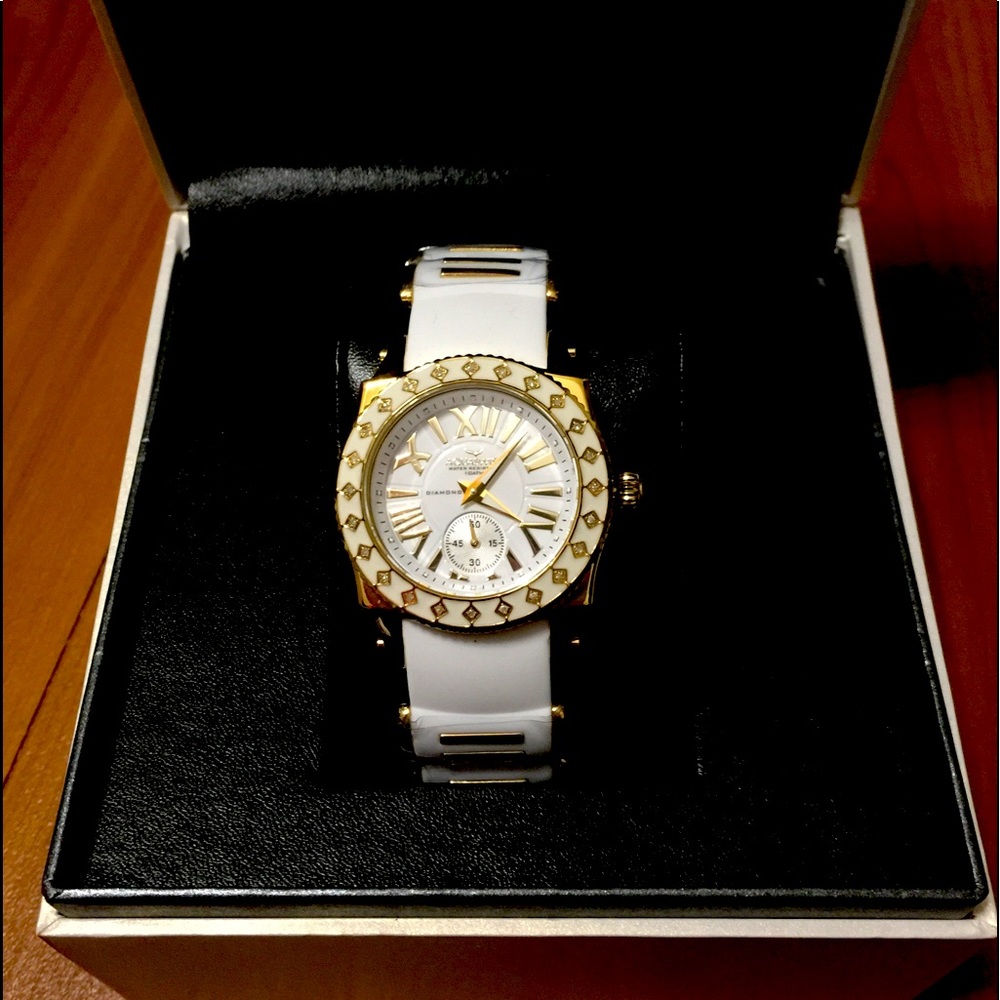 Aquaswiss women’s gold/white watch